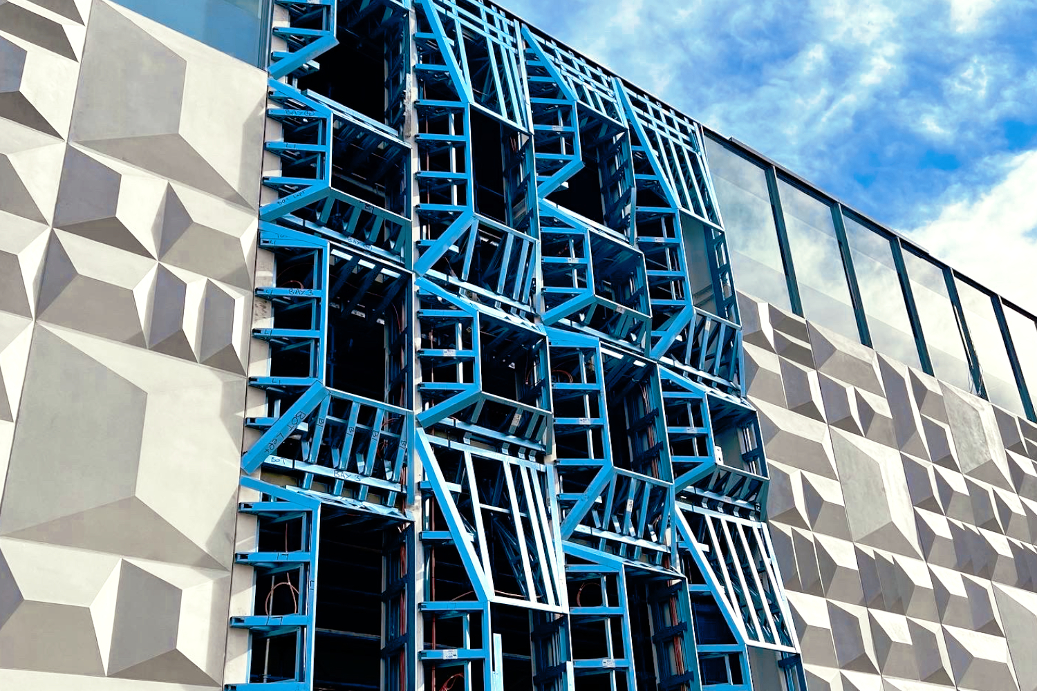 Bell Station glazed windows in lightweight steel frame facade in Preston, Melbourne, supplied by CMG Frames.