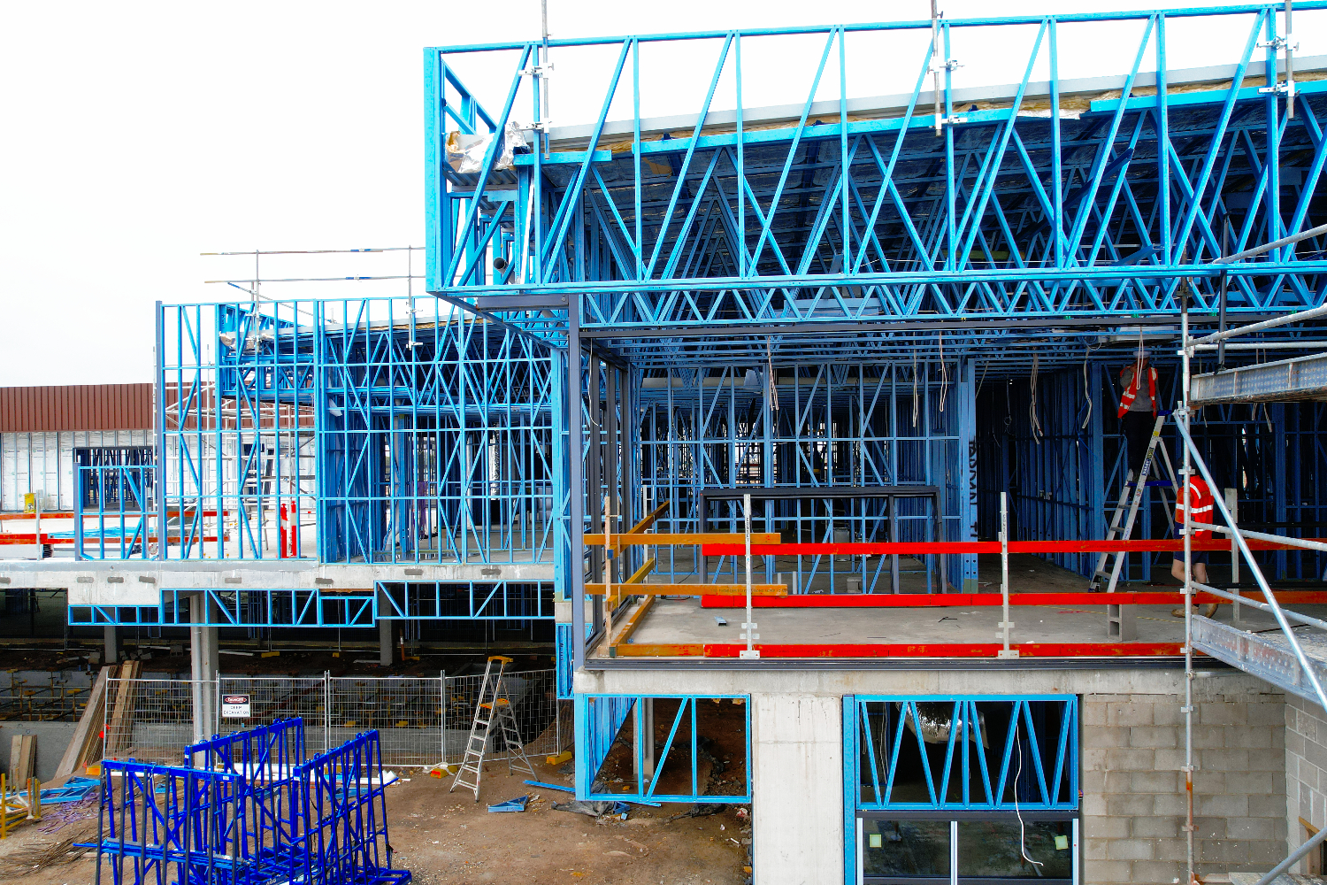 Lightweight steel framing enabling sweeping architectural curves at Jardon Redstone Sunbury, by CMG Frames.