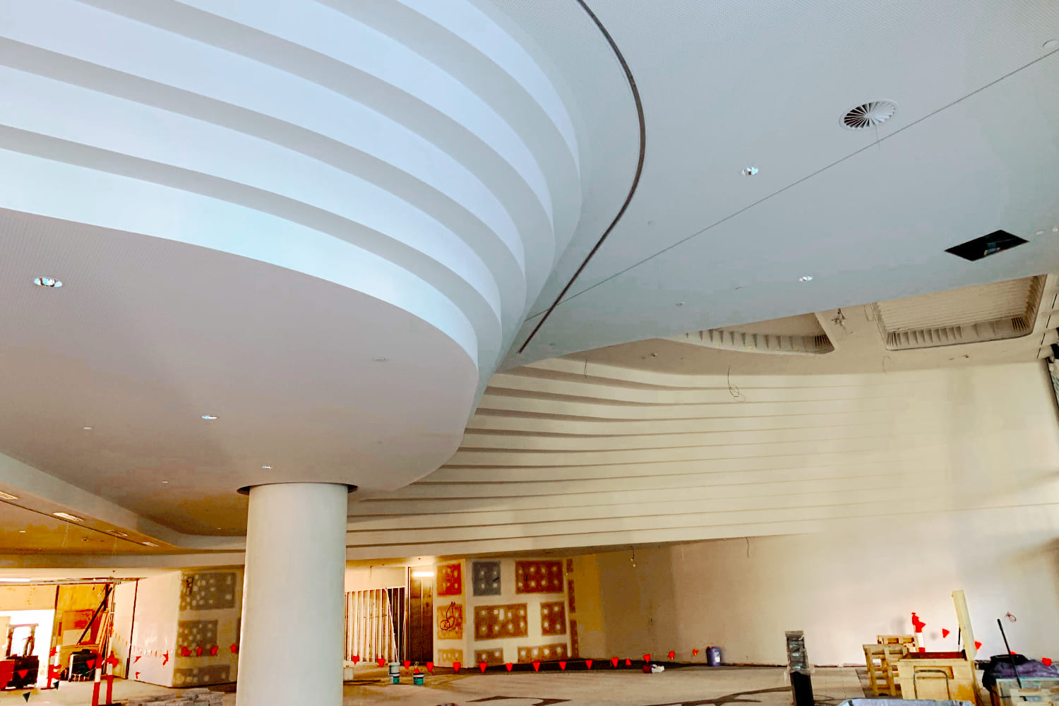 1000 La Trobe Street, Docklands, Melbourne curved feature ceiling built with Custom Curved Lightweight Steel Feature Ceiling Framing supplied by CMG Frames in project with Probuild and Woods Bagot architects.