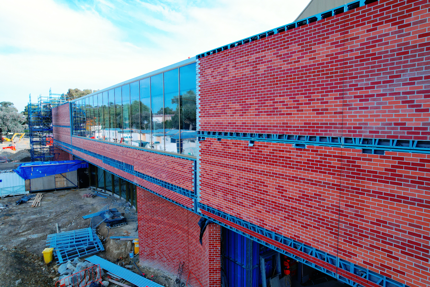 The Round Whitehorse Performing Arts Centre in Nunawading, Melbourne, with a brick-slip light guage steel frame face designed by CMG Frames.