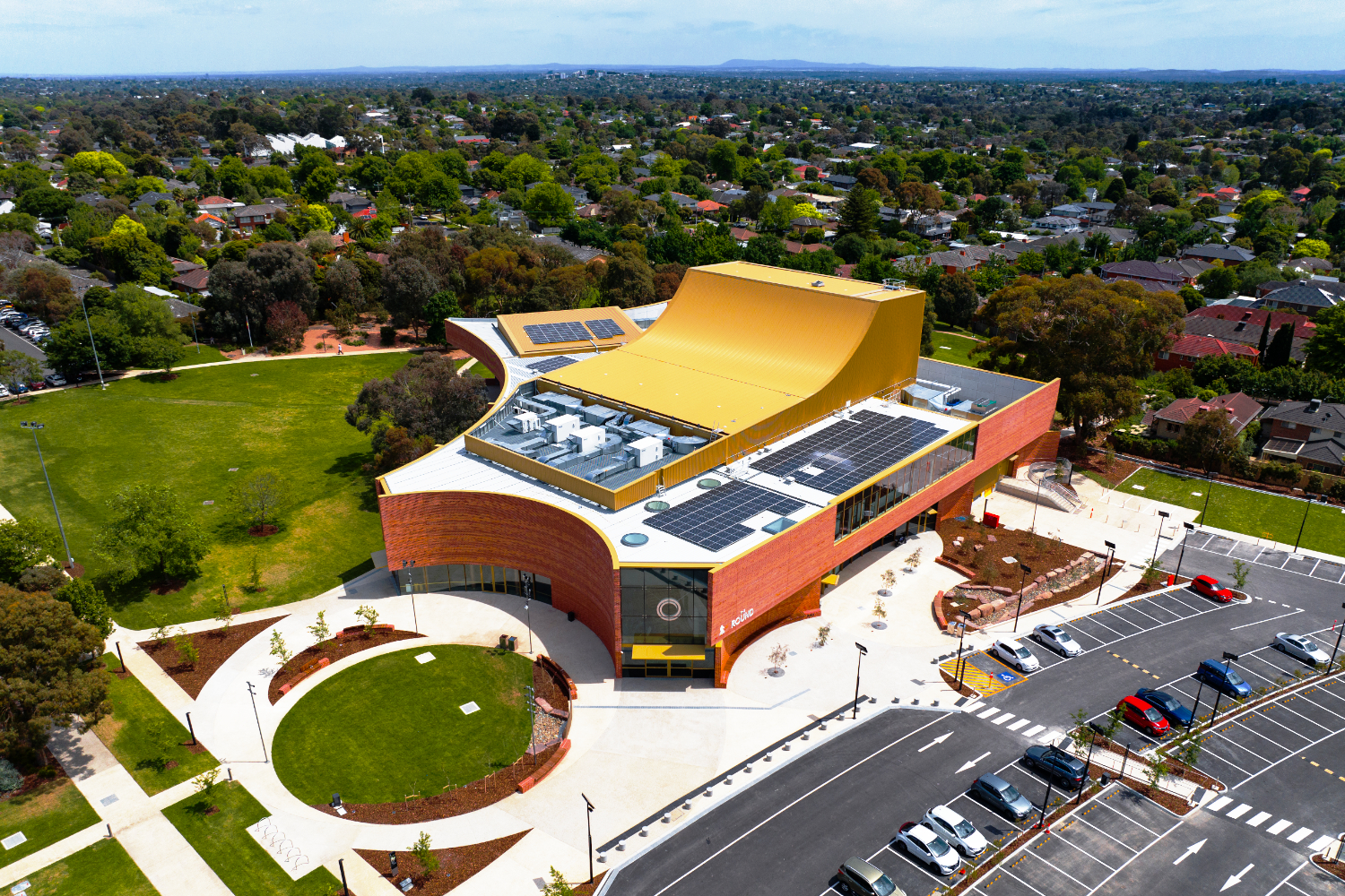 The Round Whitehorse Performing Arts Centre in Nunawading, Melbourne, with a brick-slip light guage steel frame face designed by CMG Frames.