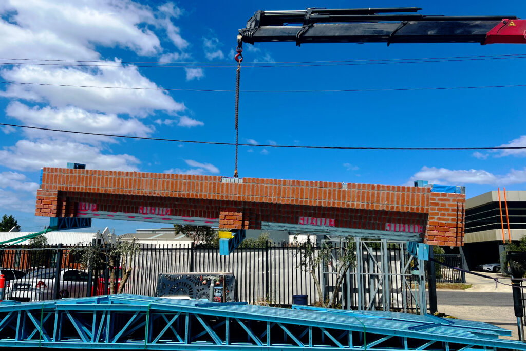 Prefabricated modular lightweight steel frame facade with a brick slip system by CMG Frames at Mcnab Avenue, Footscray.